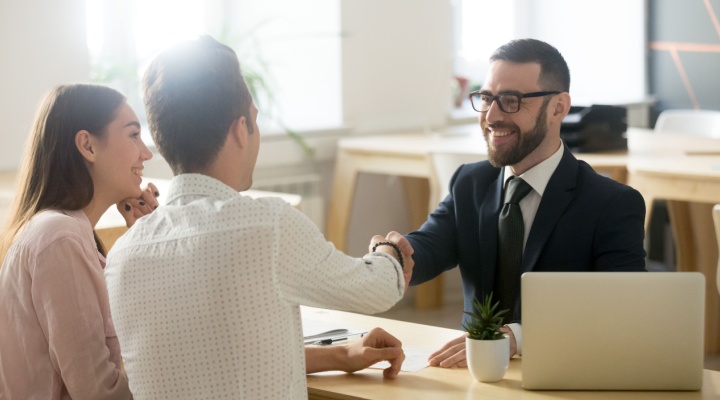 A couple meeting with a financial planner.